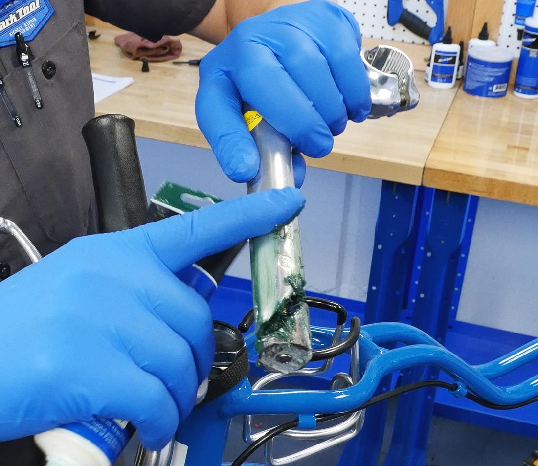 Apply grease to threads and contact points