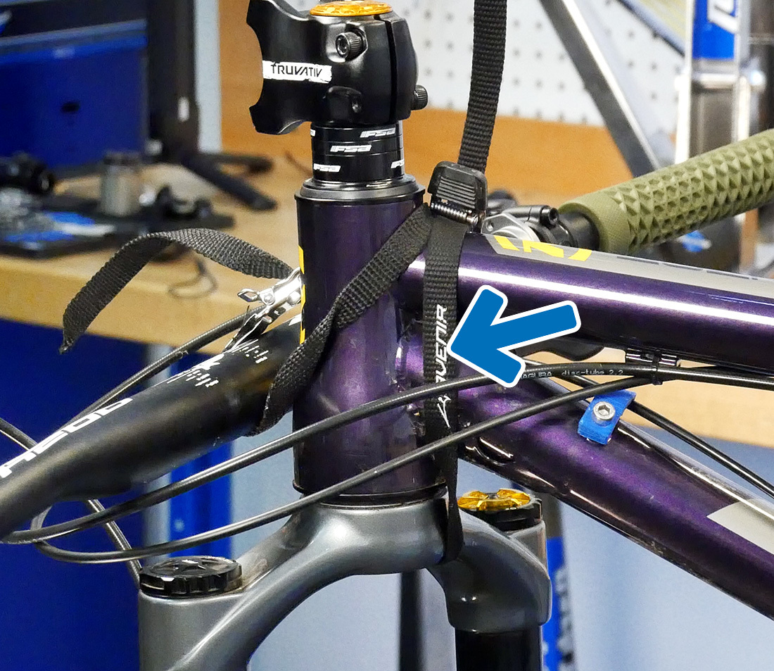 Second toe strap to keep fork in frame