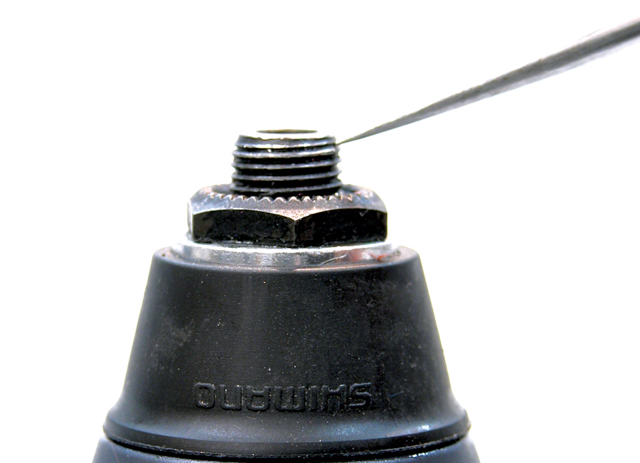 Count the number of threads past locknut face for a reference of axle protrusion