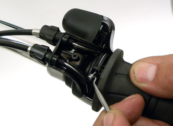 Figure 4. Use seal pick to left and remove cable end