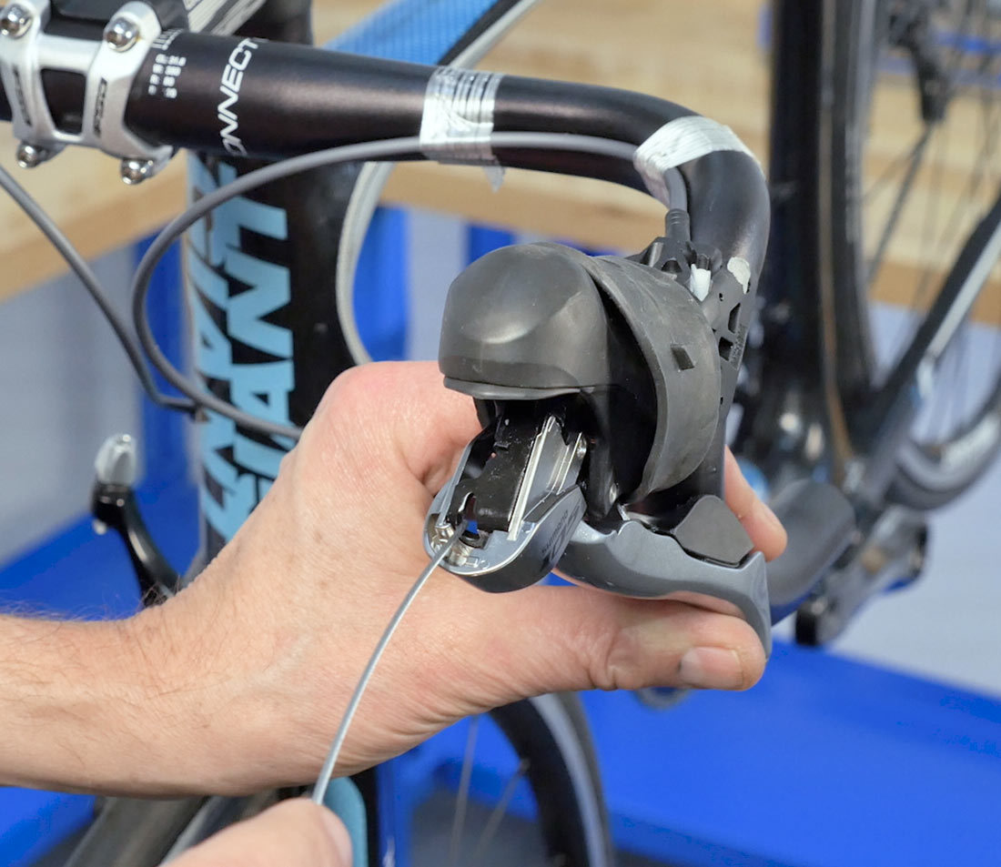 Engage cable end through brake lever