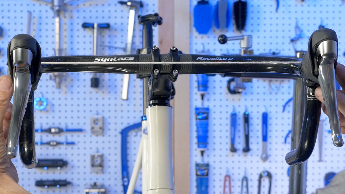 Pull string to act as a straight edge to even lever height