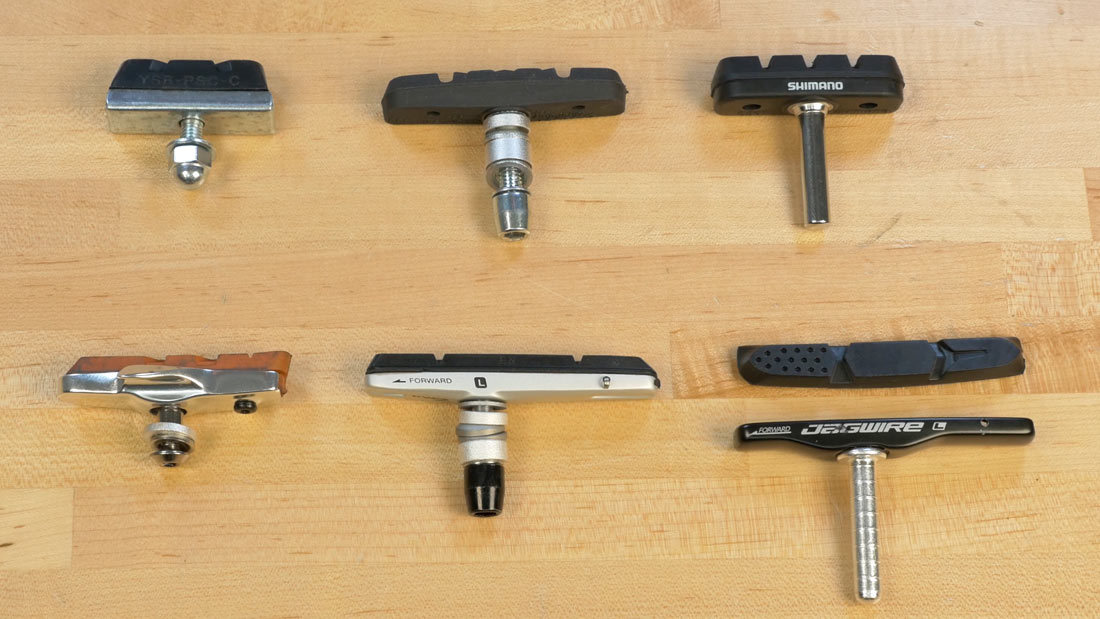 Top pads are "one-piece" pads; lower three pads are replaceable cartridge pads
