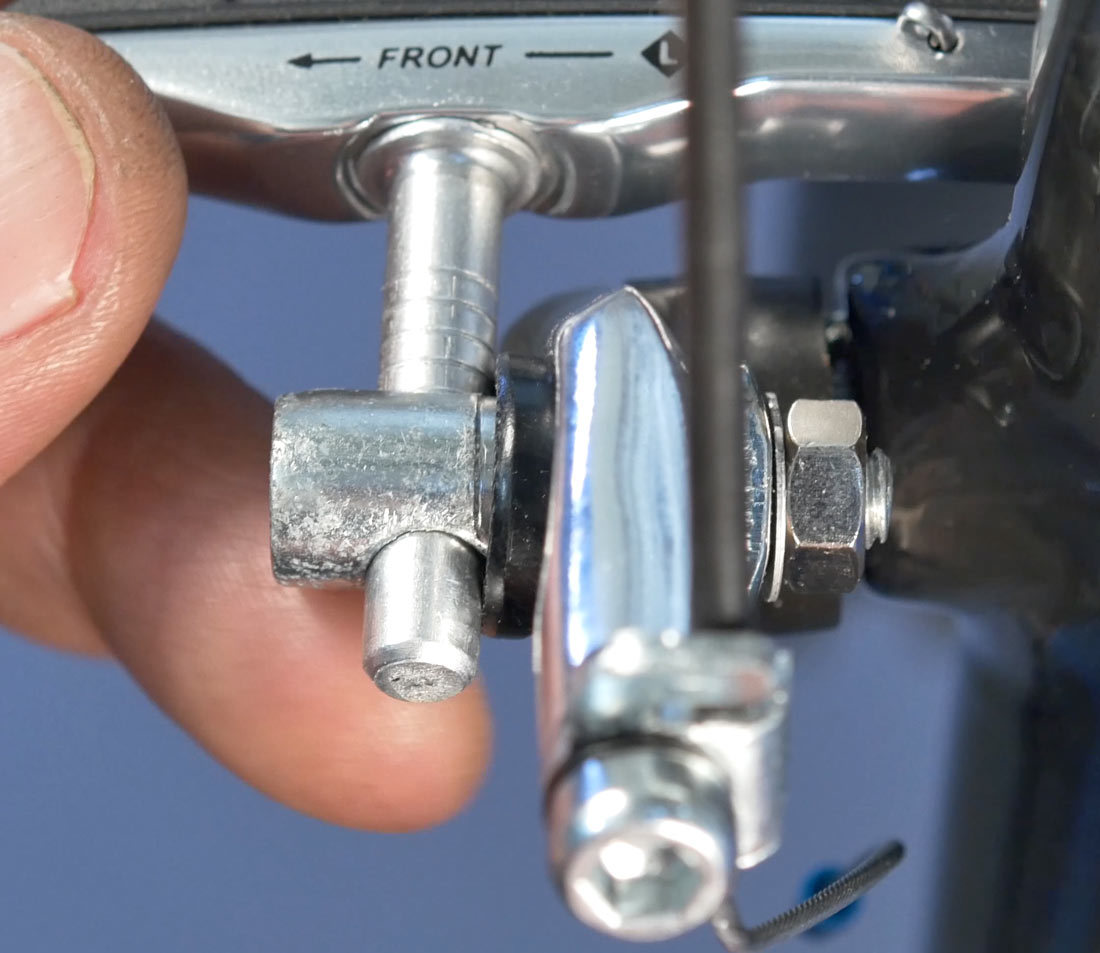 Install new pad while noting washer orientation