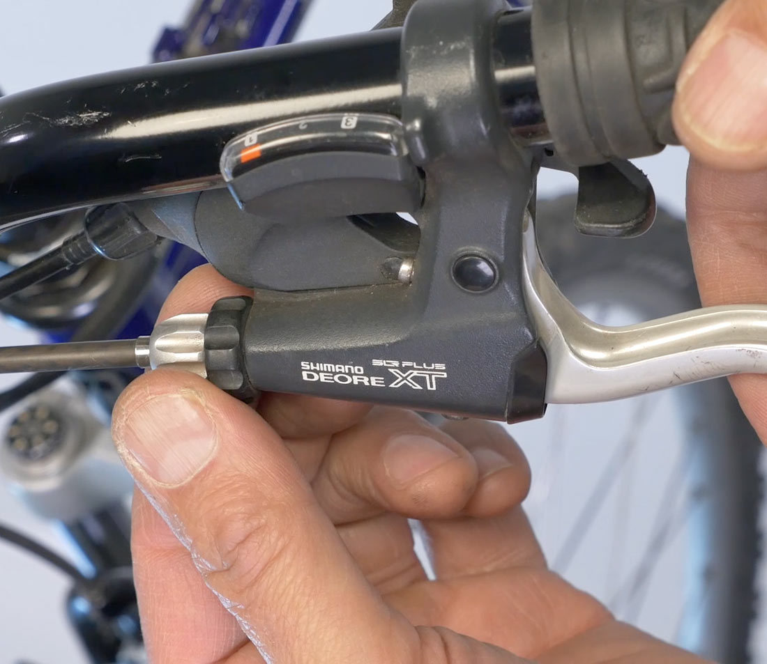 Use barrel adjuster to find tune pad clearance