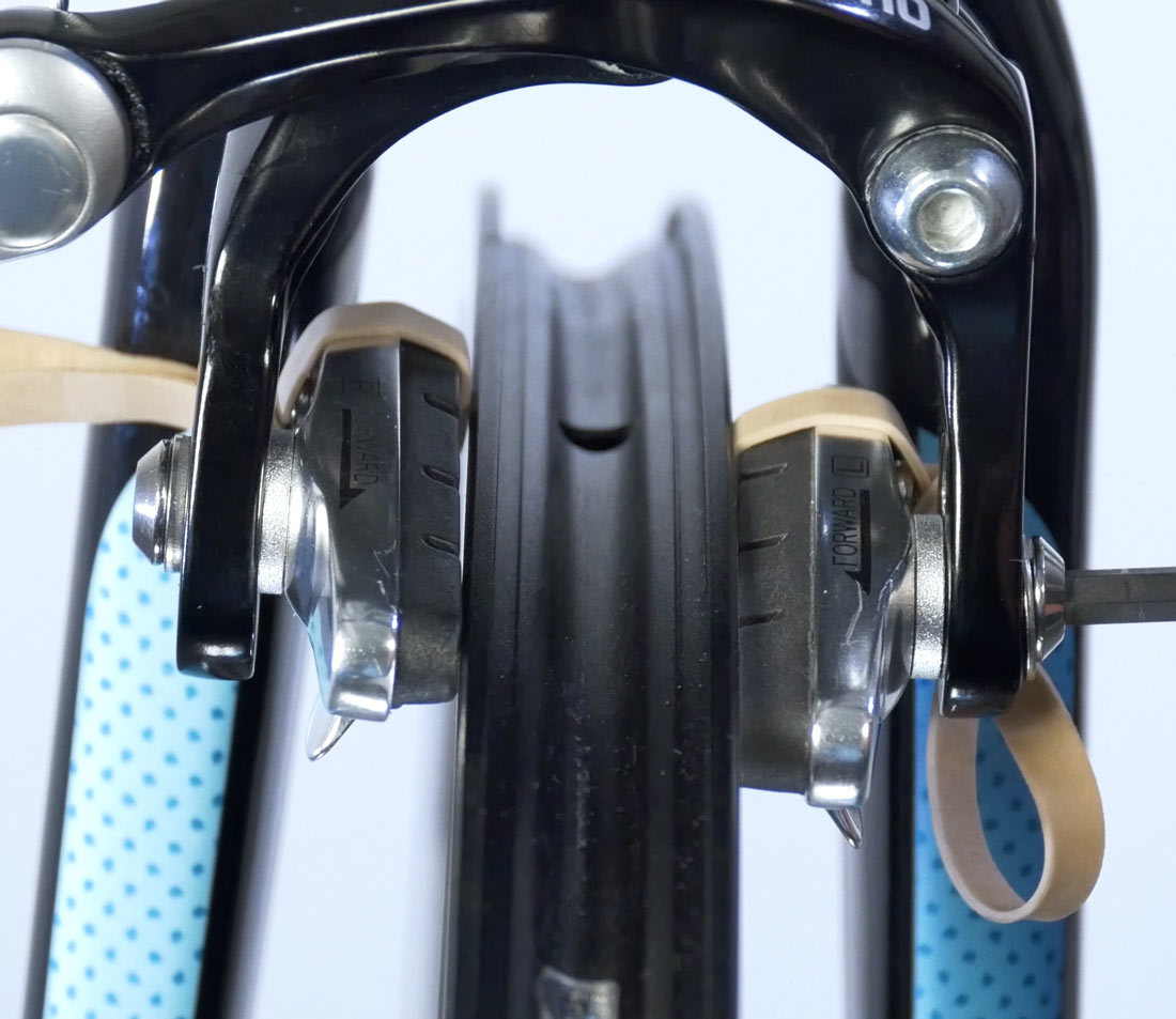 Using a shim at the back edge to create toe