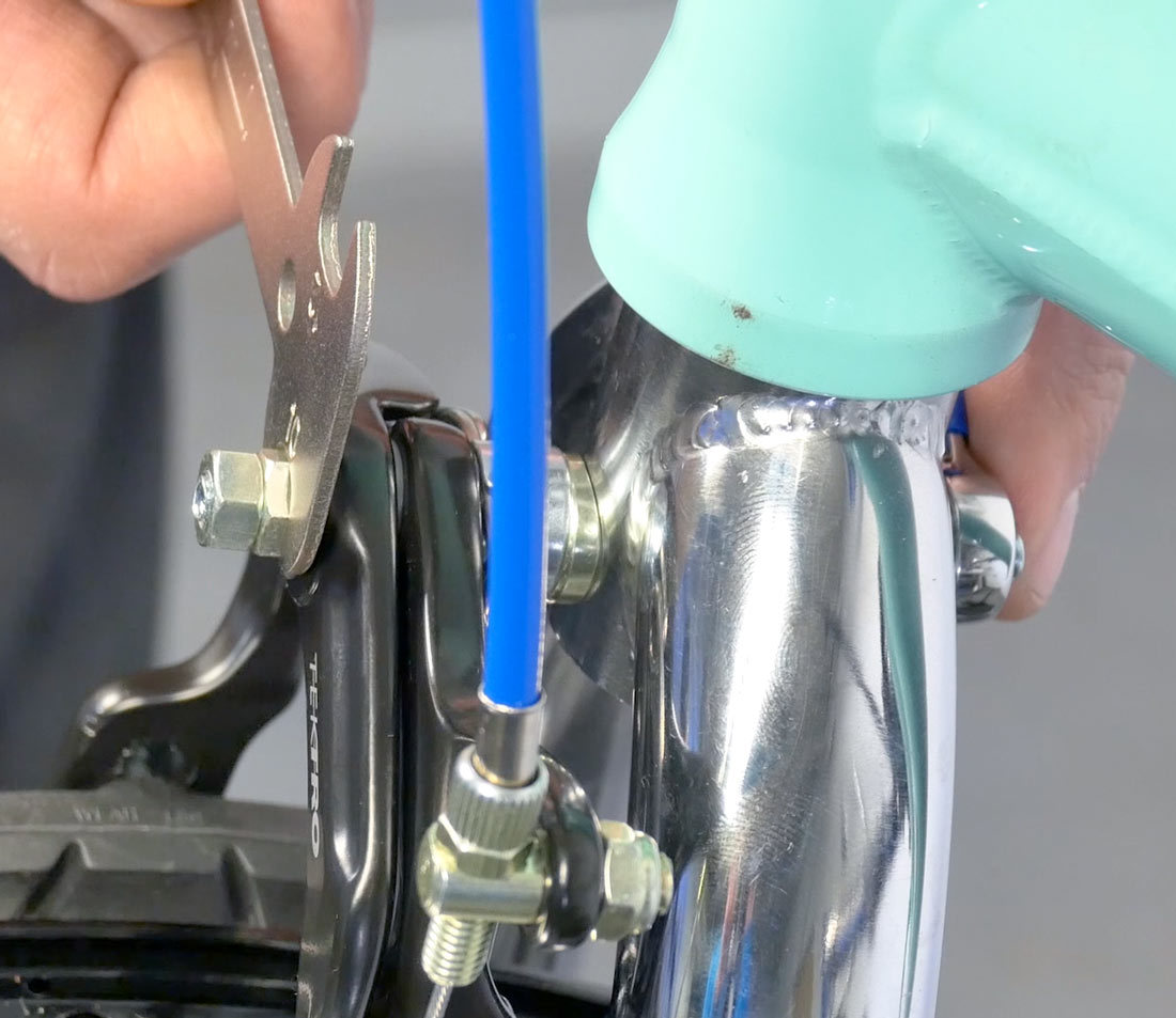 Centering using arm locknut and brake mounting nut
