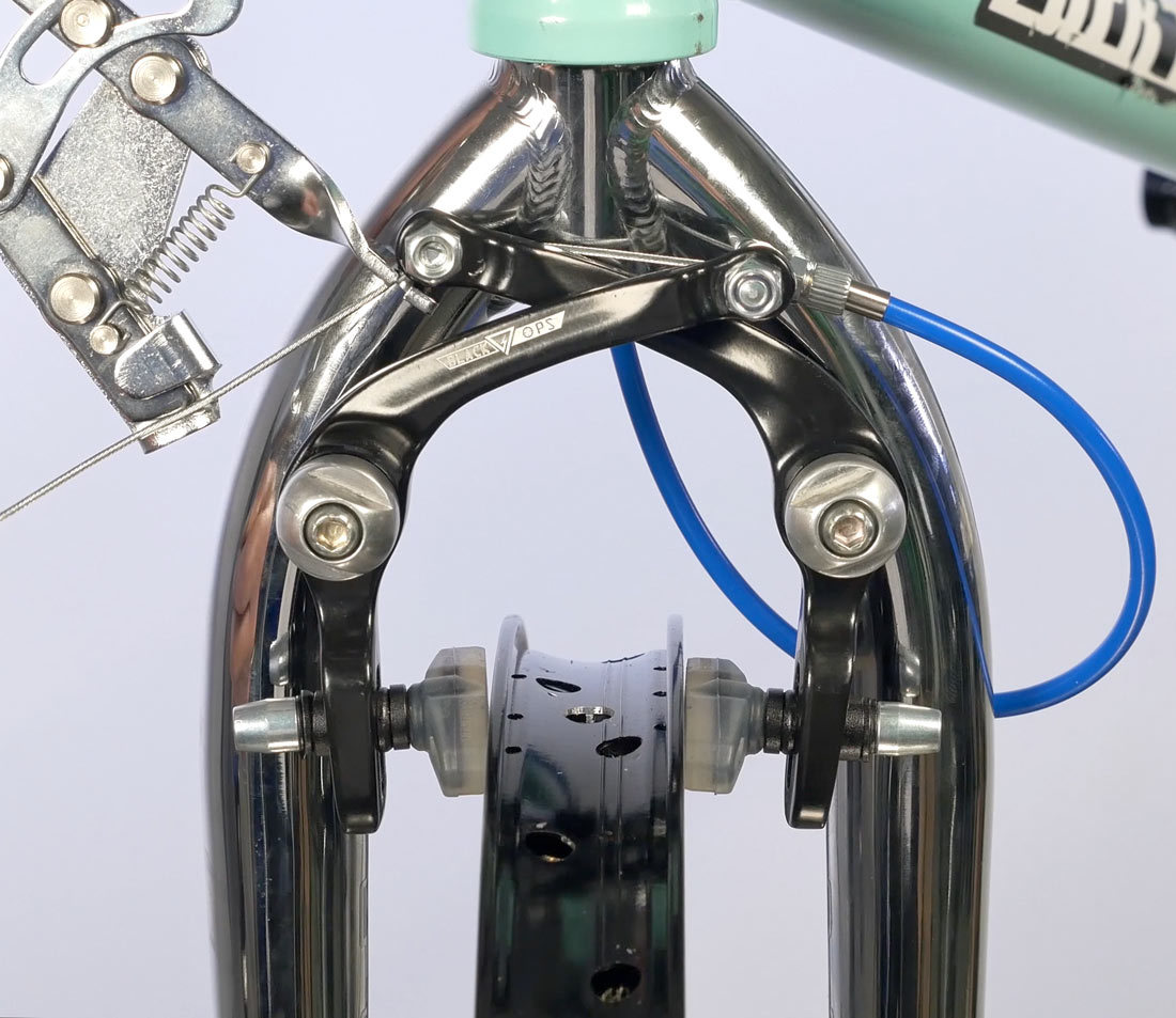 Draw pads to rim before securing pinch bolt