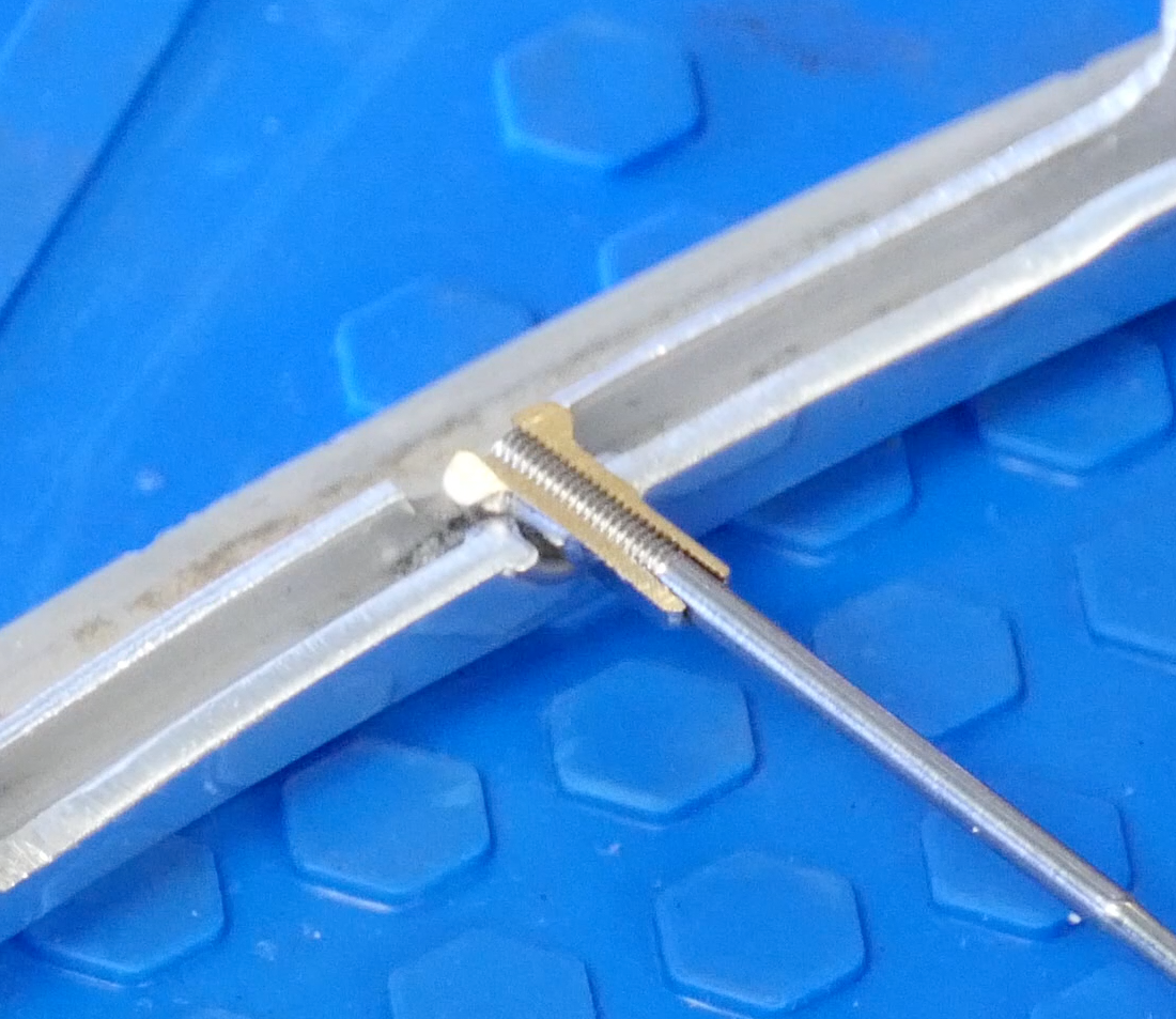 Cutaway showing spoke nipple position in rim and properly sized spoke that doesn't protrude